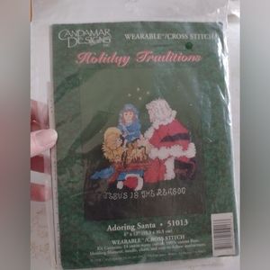 Christmas cross stitch by Candamar designs. Adoring Santa 51013.  1998. …